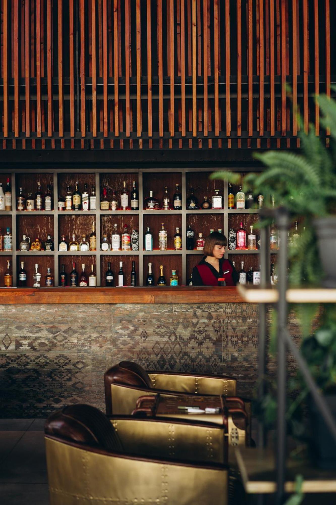 Gudauri Loft Hotel Exterior photo A bartender at work